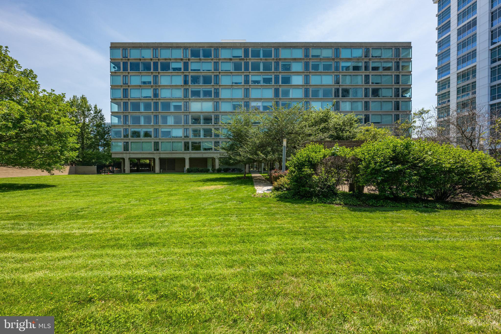 1101 3rd Street Southwest, Unit 315 Washington, DC 20024 - Photo 37 of 38 a view of a building with a garden