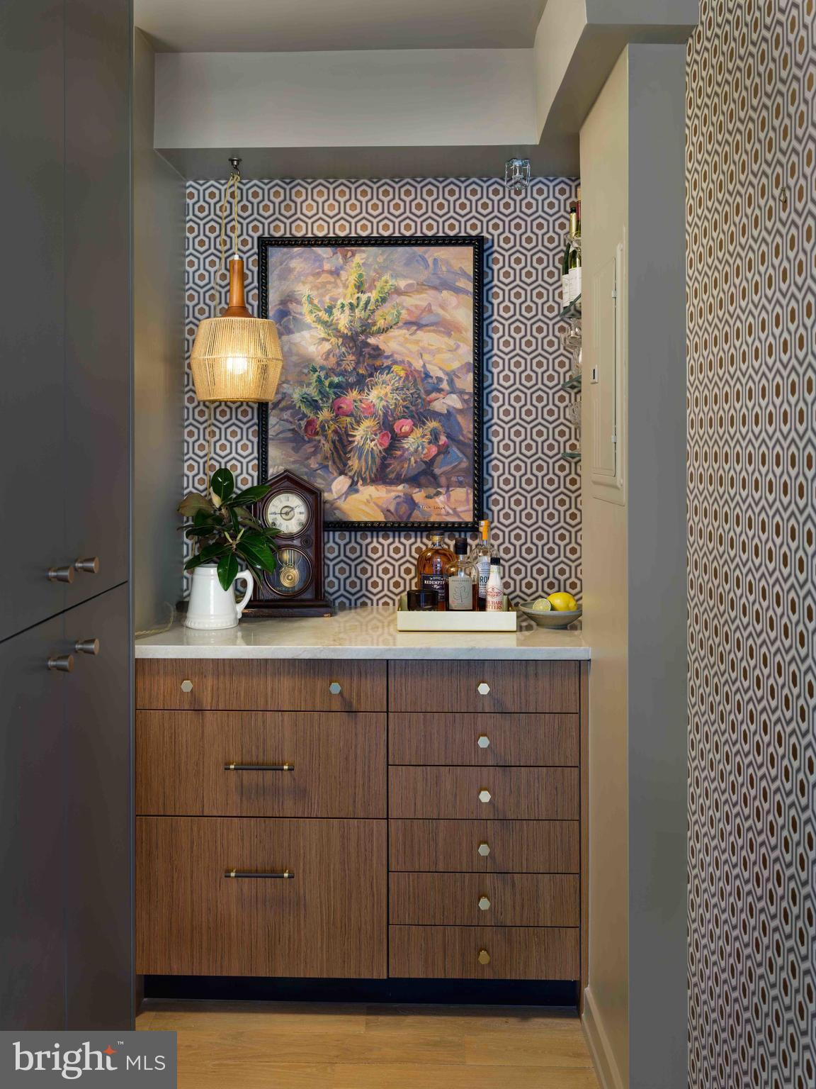 1101 3rd Street Southwest, Unit 315 Washington, DC 20024 - Photo 4 of 38 a bathroom with a sink mirror and cabinets