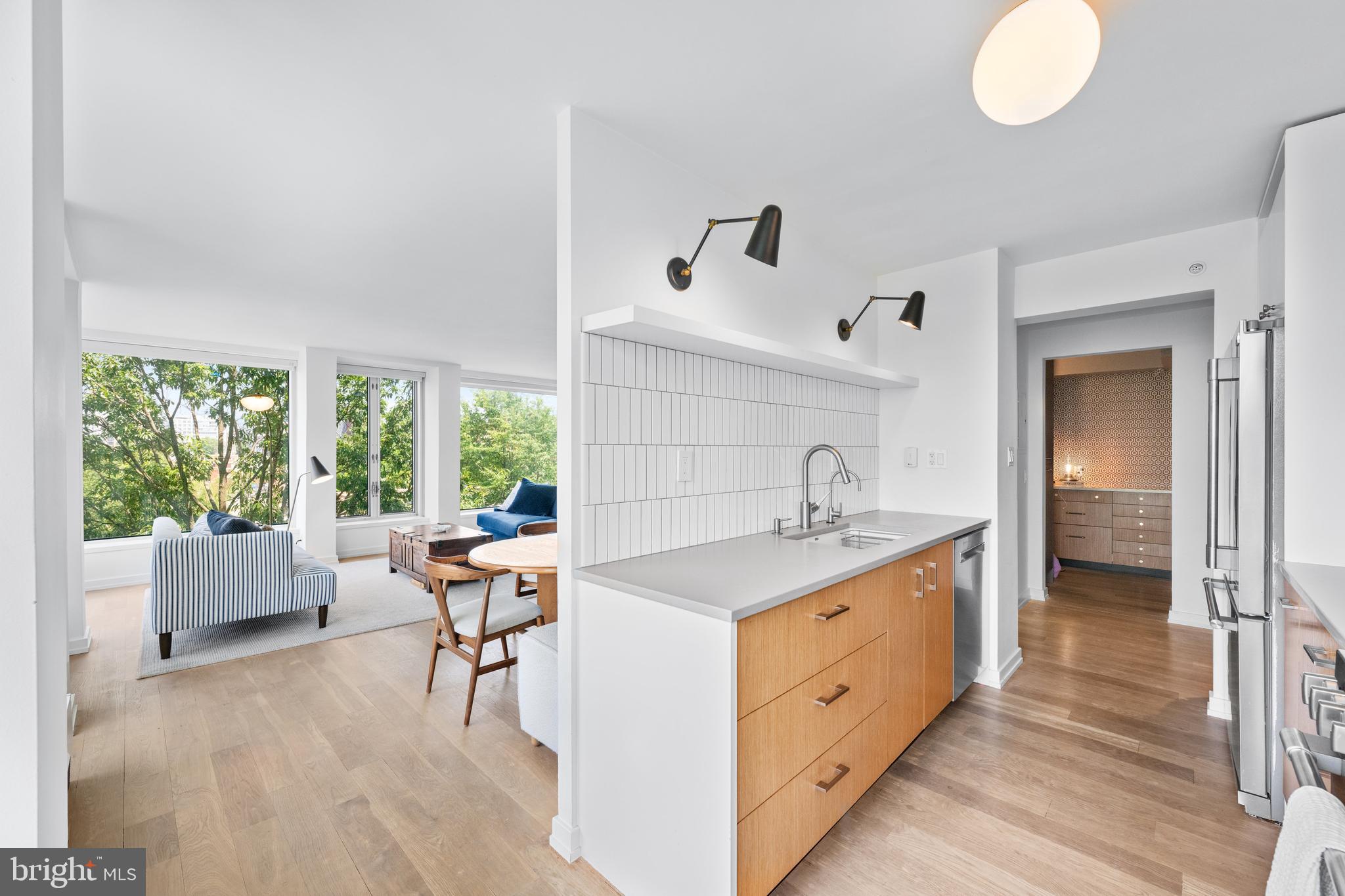 1101 3rd Street Southwest, Unit 315 Washington, DC 20024 - Photo 9 of 38 a spacious bathroom with 2 sink and a large mirror
