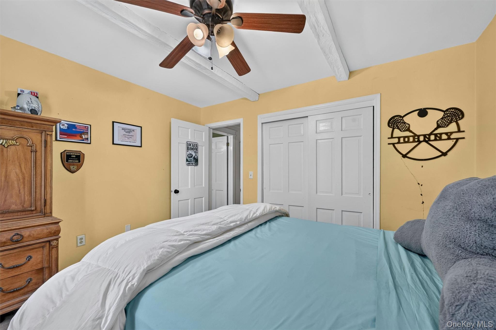 5 Hedges Road Warwick, NY 10990 - Photo 30 of 48 A bright secondary bedroom with a ceiling fan, closet storage, and enough space for a full bedroom setup.