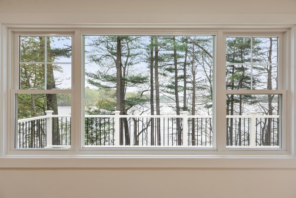 50 Pine Grove Road Lunenburg, MA 01462 - Photo 16 of 42 a view of a balcony with a lake view