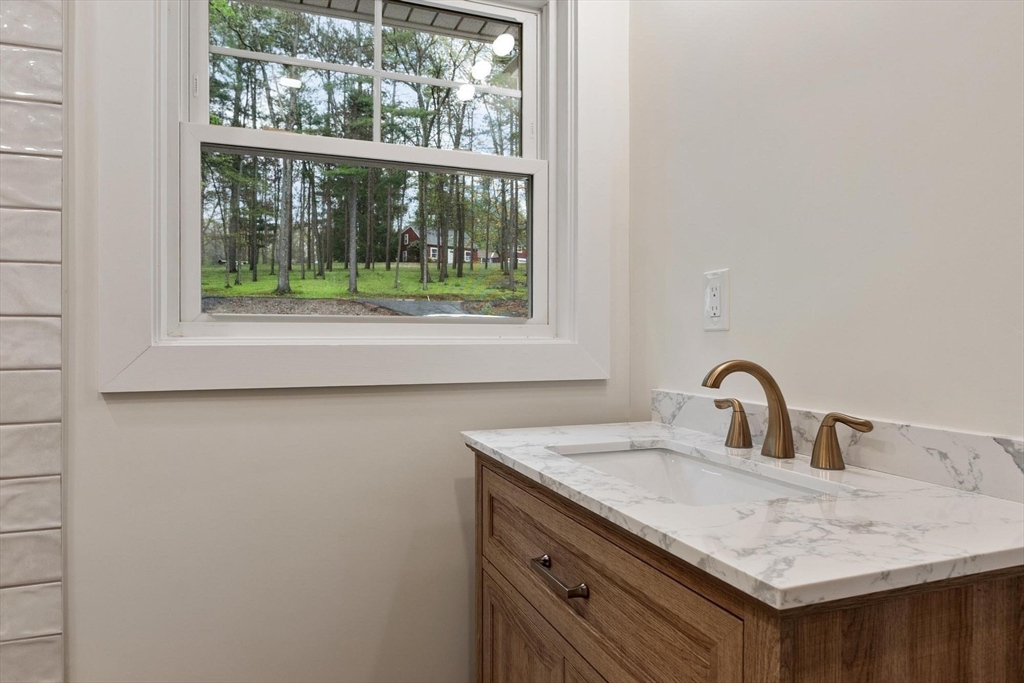 50 Pine Grove Road Lunenburg, MA 01462 - Photo 23 of 42 a close view of sink and tap