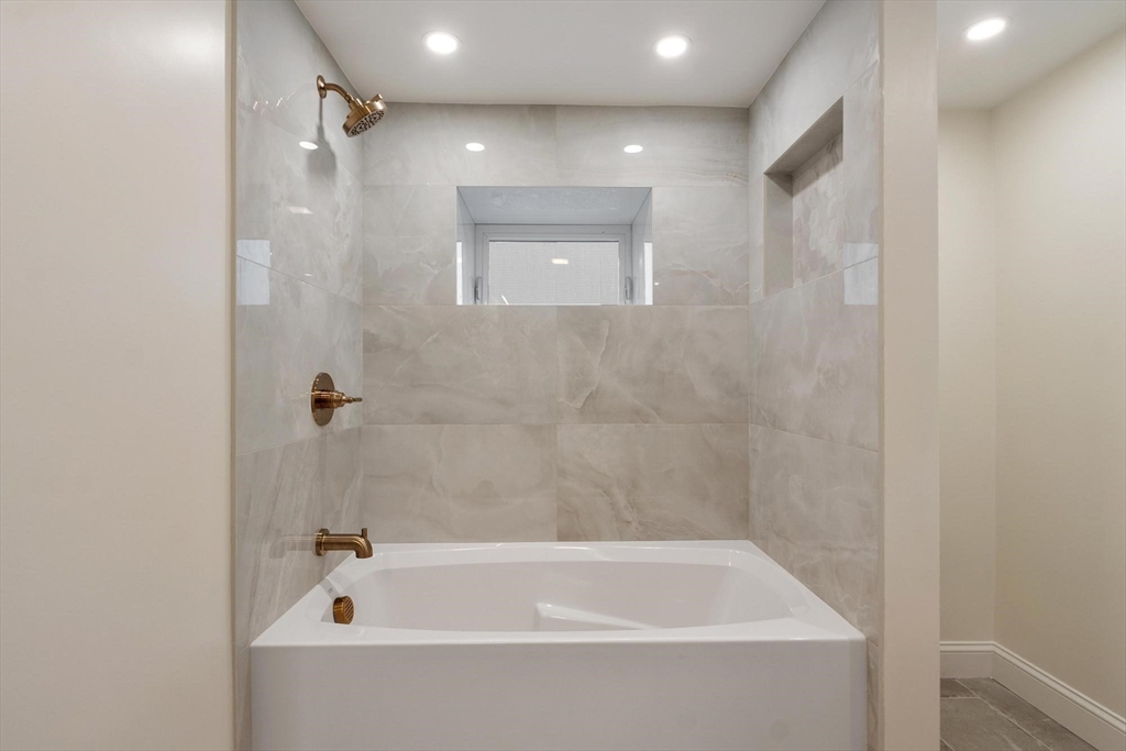 50 Pine Grove Road Lunenburg, MA 01462 - Photo 33 of 42 a bathroom with a bathtub