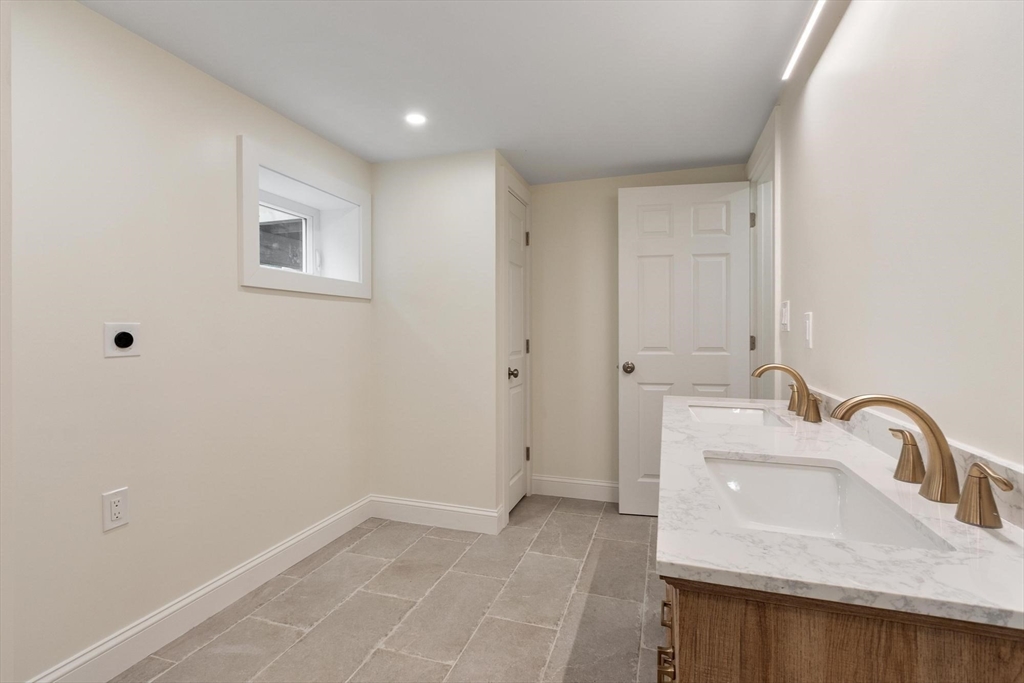 50 Pine Grove Road Lunenburg, MA 01462 - Photo 34 of 42 a bathroom with a sink and a mirror