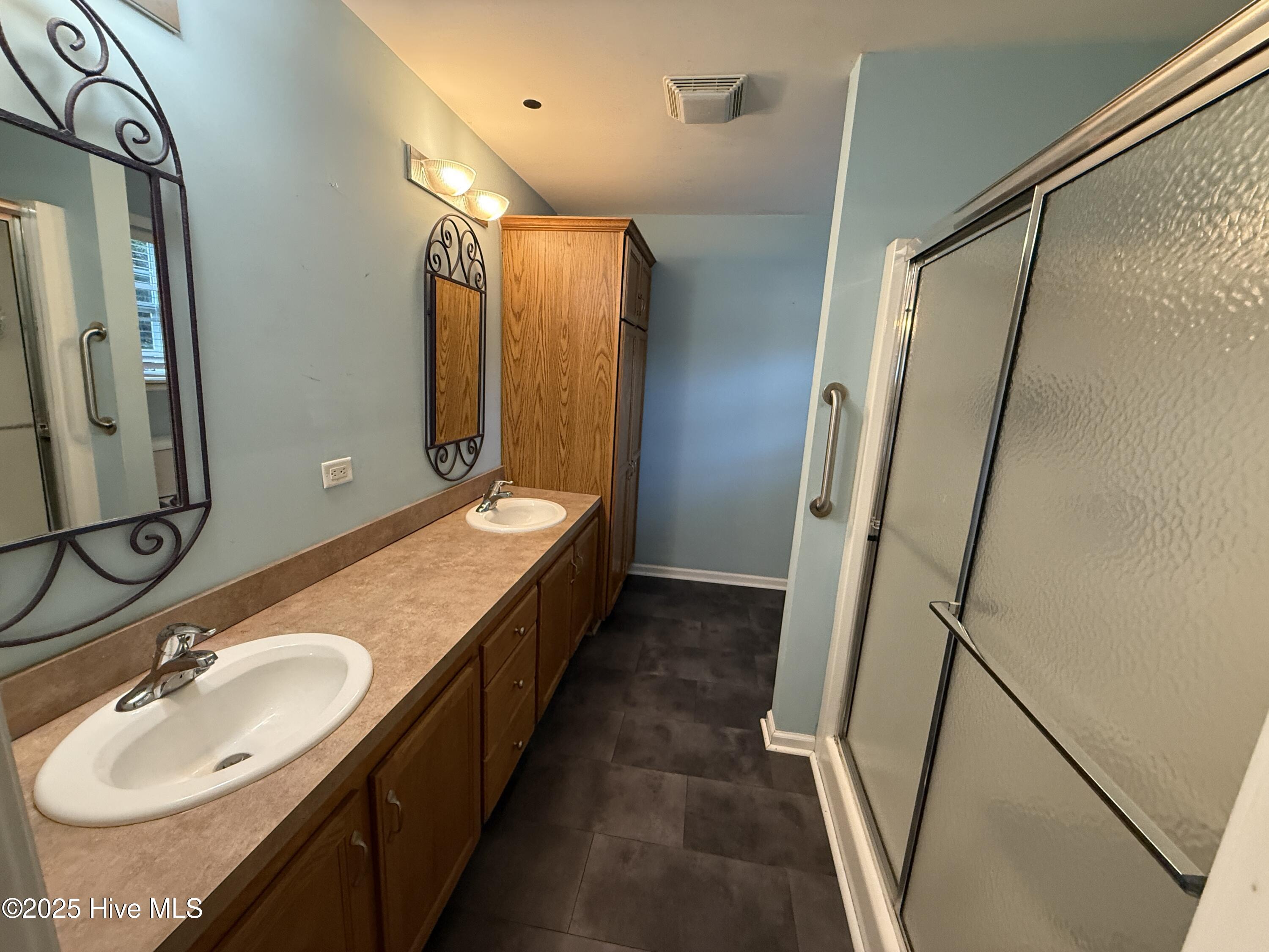1094 Clubview Lane Southwest Calabash, NC 28467 - Photo 8 of 14 Primary bath with double sinks.