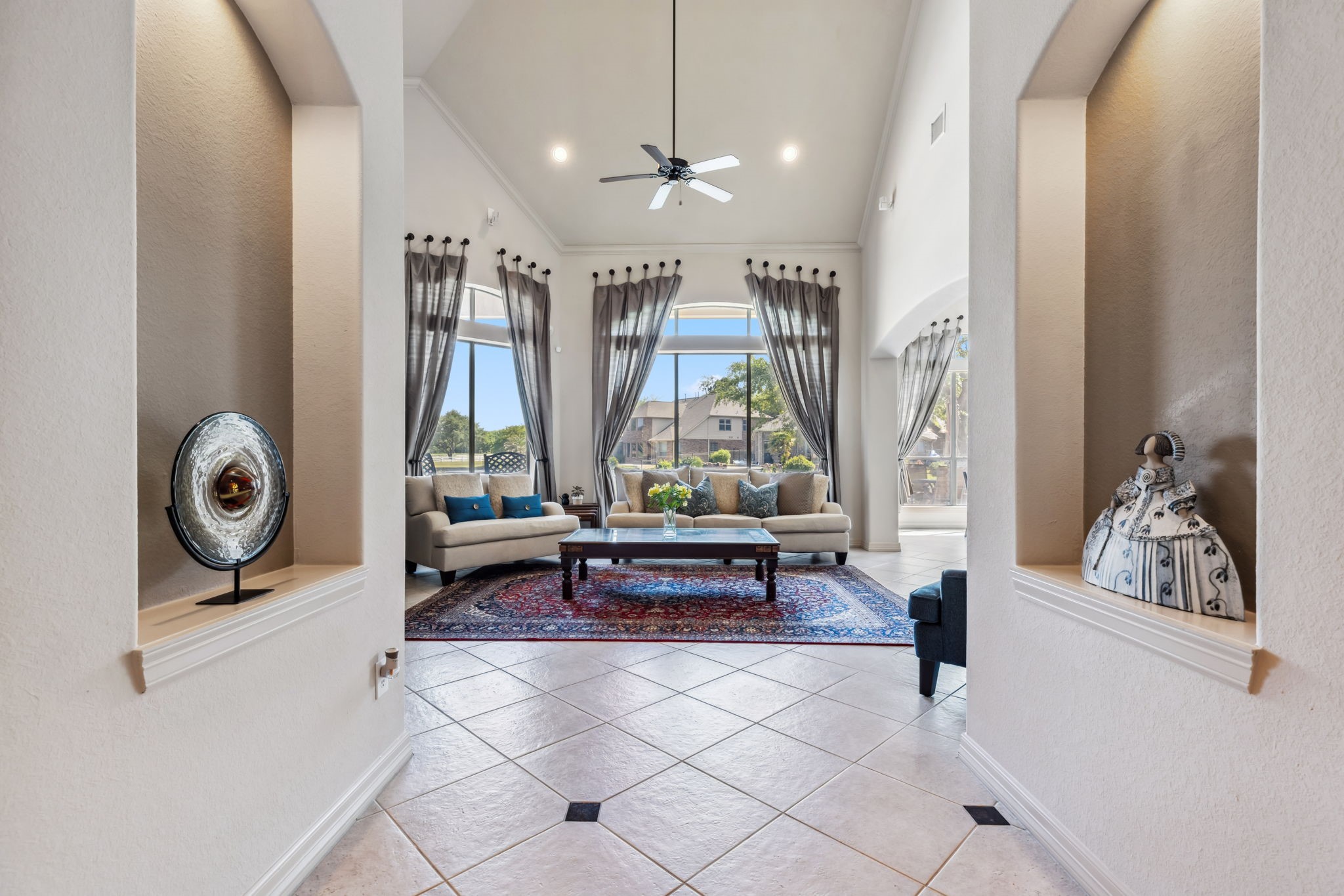 8411 Middle Canyon Road Katy, TX 77494 - Photo 16 of 49 a living room with furniture and a large window