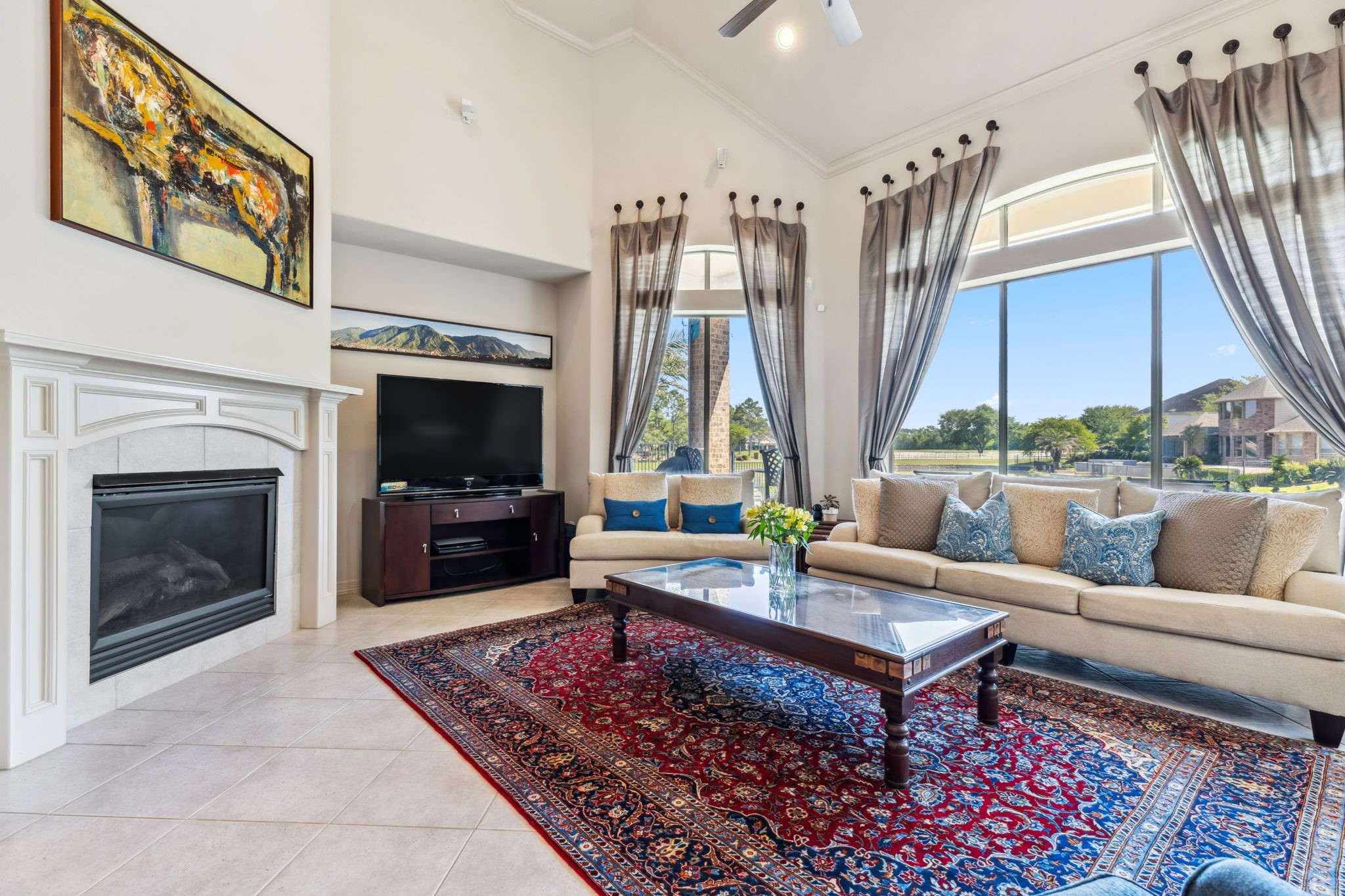 8411 Middle Canyon Road Katy, TX 77494 - Photo 18 of 49 a living room with patio furniture and a fireplace