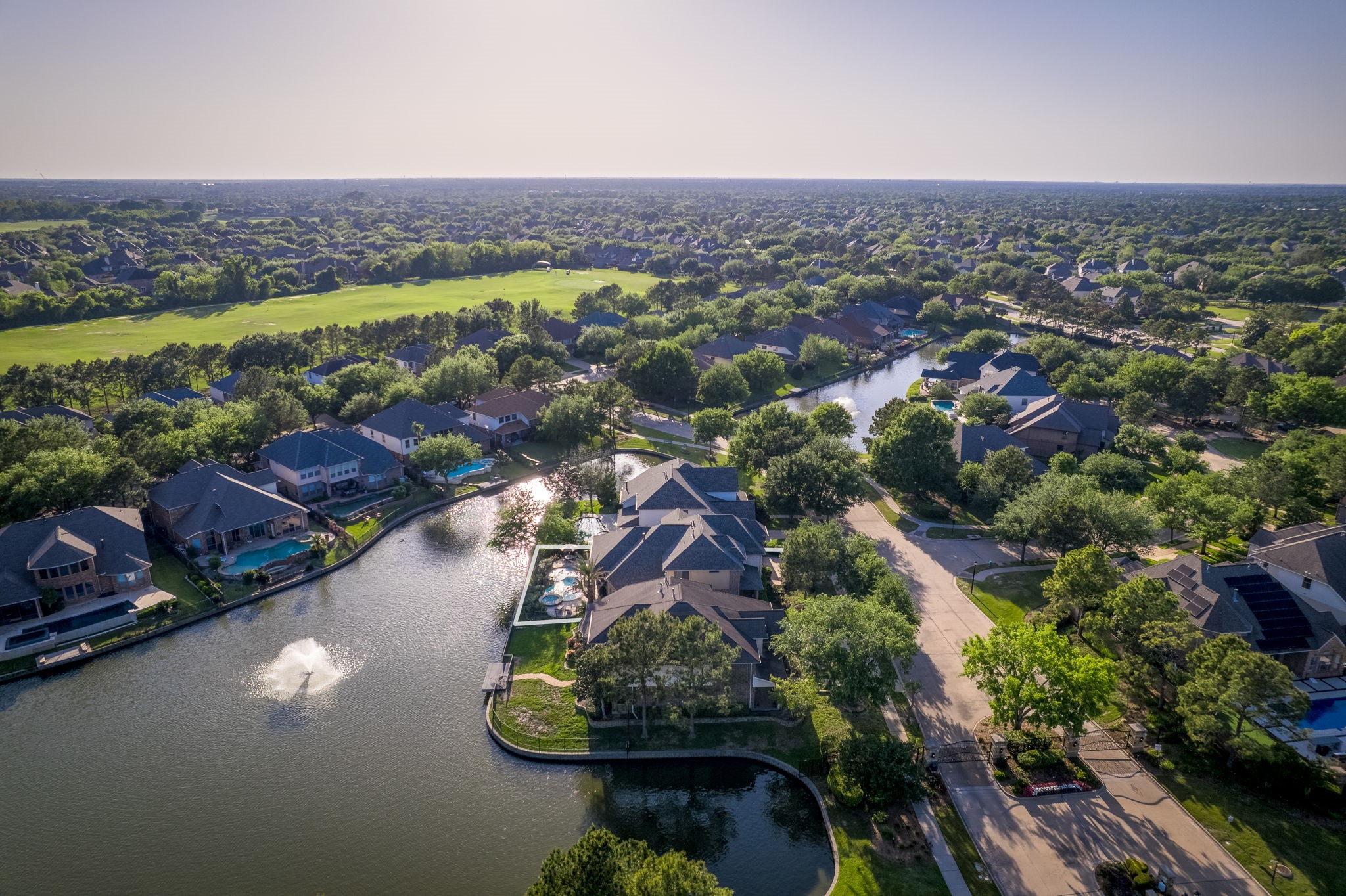 8411 Middle Canyon Road Katy, TX 77494 - Photo 2 of 49 an aerial view of a city with lots of residential buildings