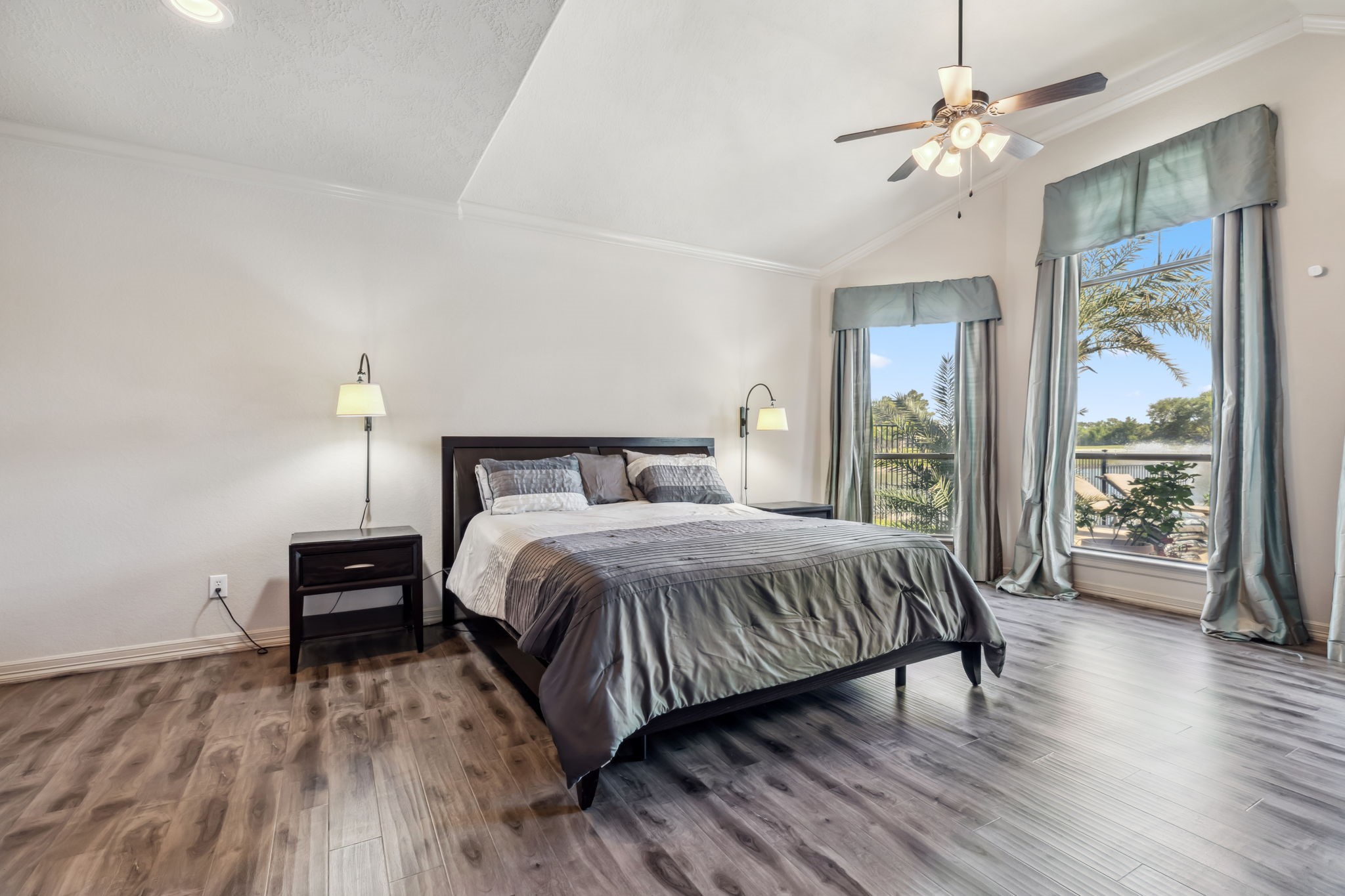 8411 Middle Canyon Road Katy, TX 77494 - Photo 31 of 49 a bedroom with a large bed and a tv