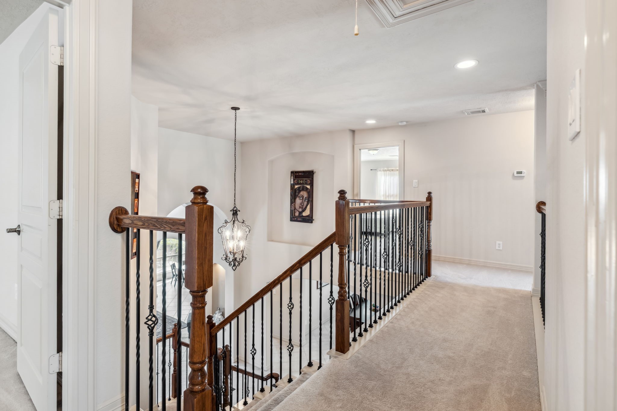 8411 Middle Canyon Road Katy, TX 77494 - Photo 36 of 49 a view of a hallway with windows and stairs