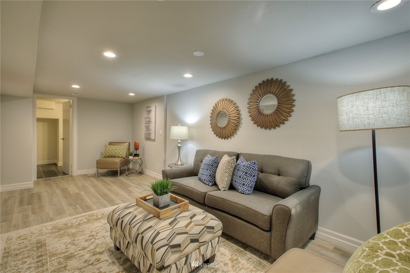 12222 Military Road South Seattle, WA 98168 - Photo 24 of 33 a living room with furniture and a lamp