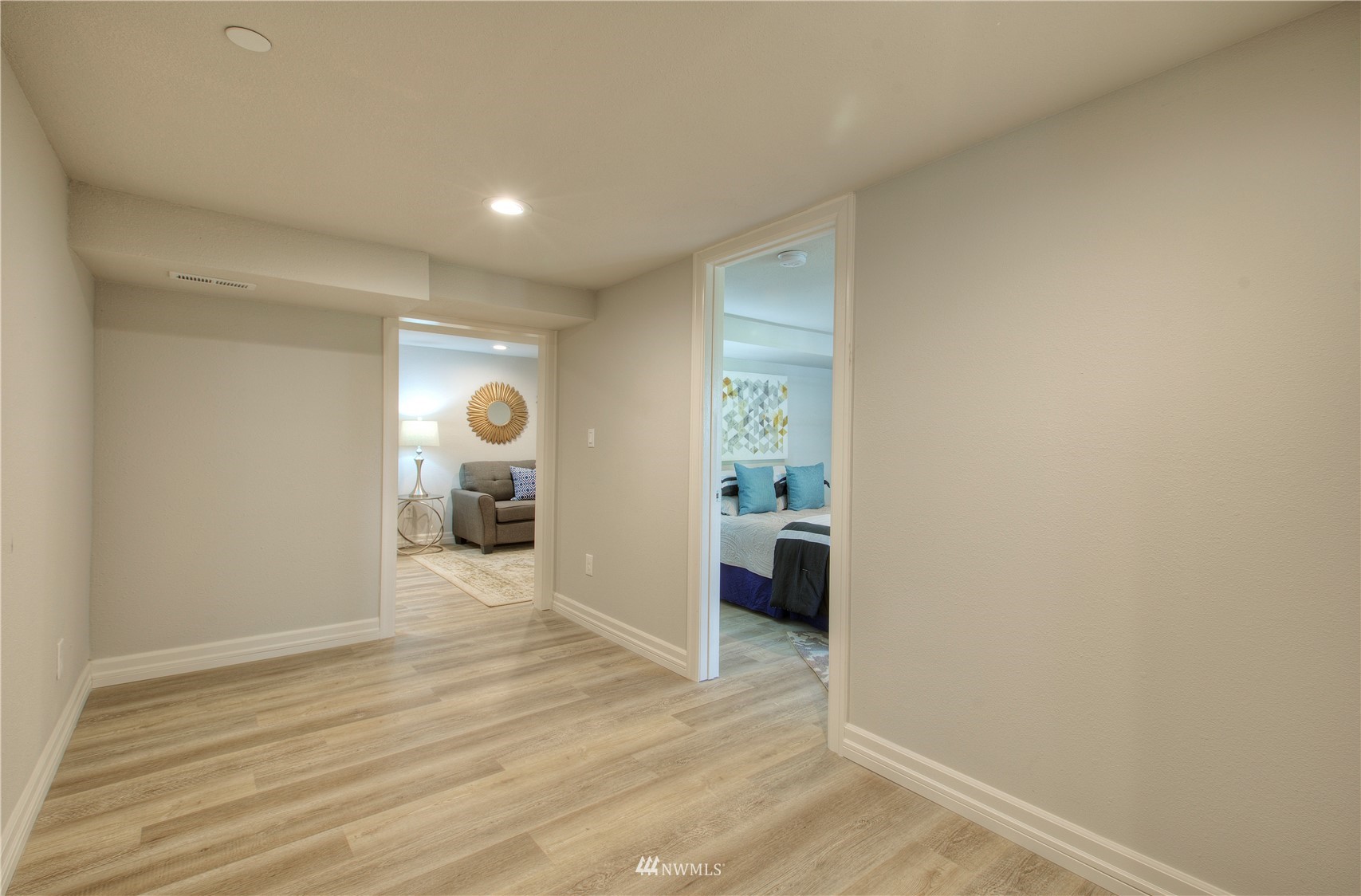 12222 Military Road South Seattle, WA 98168 - Photo 26 of 33 a view of a room that has a window and wooden floor