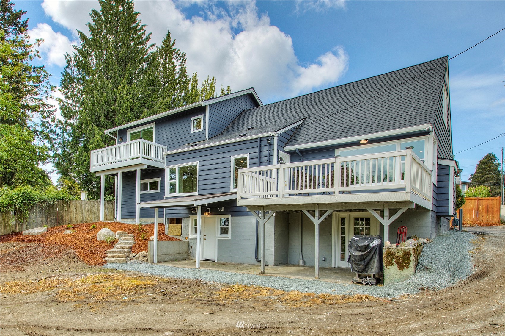 12222 Military Road South Seattle, WA 98168 - Photo 29 of 33 a front view of a house with garden