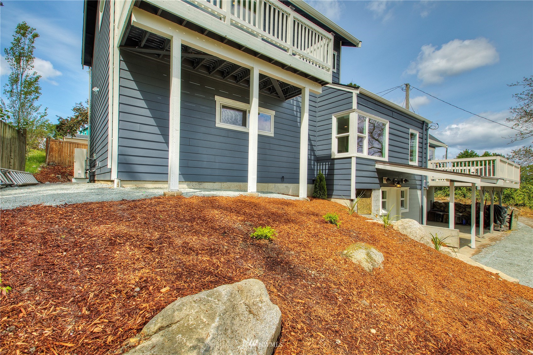 12222 Military Road South Seattle, WA 98168 - Photo 30 of 33 a view of a house with a backyard