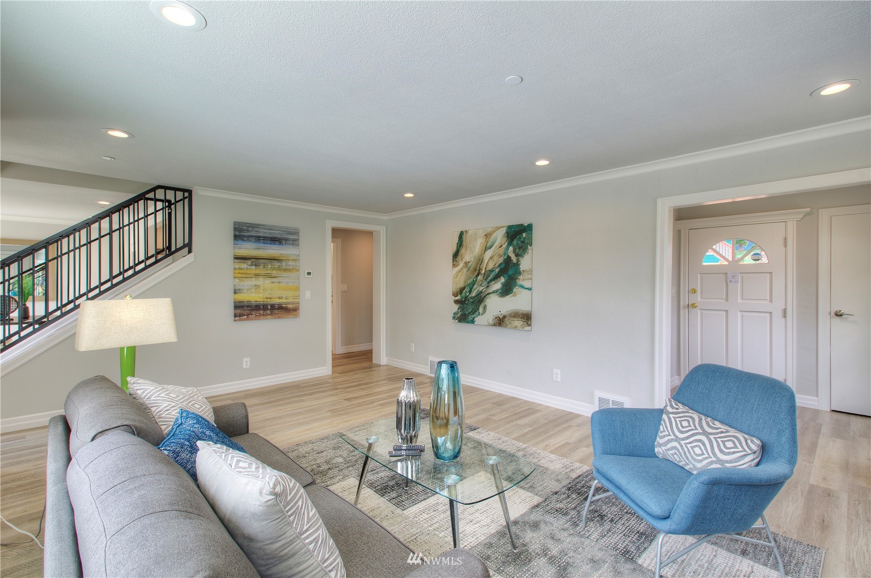 12222 Military Road South Seattle, WA 98168 - Photo 4 of 33 a living room with furniture and a wooden floor