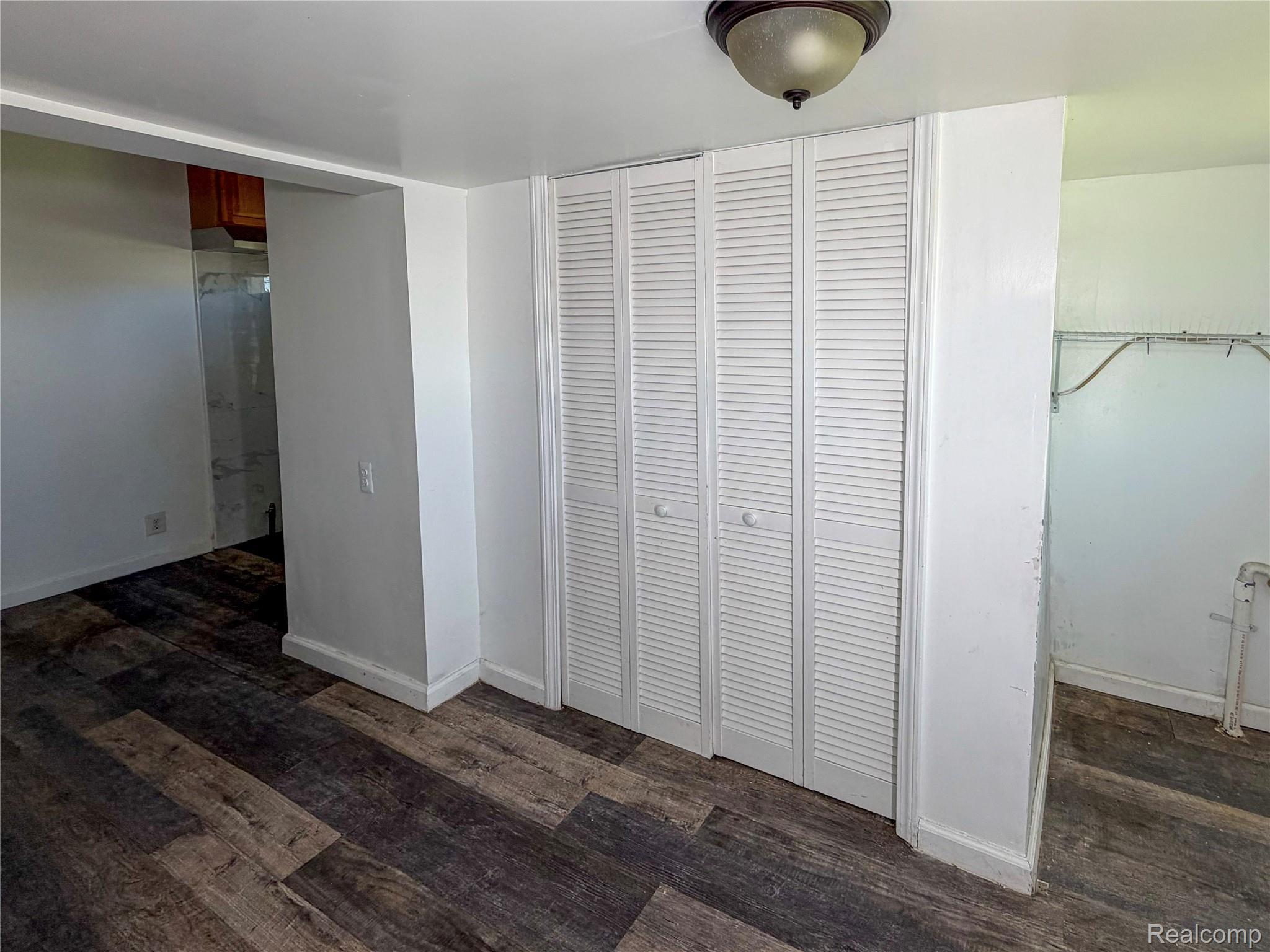 48 Florence Street River Rouge, MI 48218 - Photo 11 of 11 Detailed view of wood finished floors and baseboards