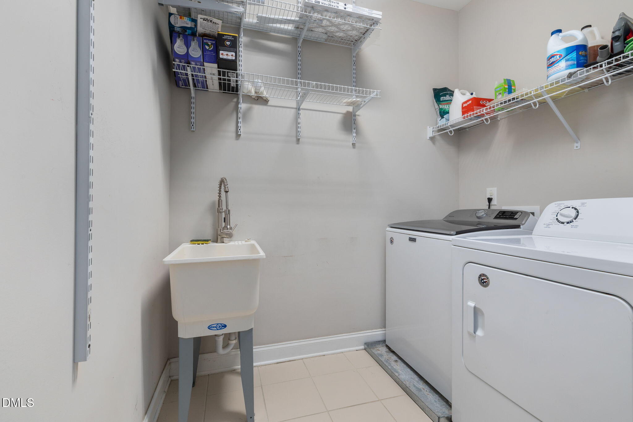 621 Fallon Grove Way Raleigh, NC 27608 - Photo 16 of 24 a utility room with dryer and washer