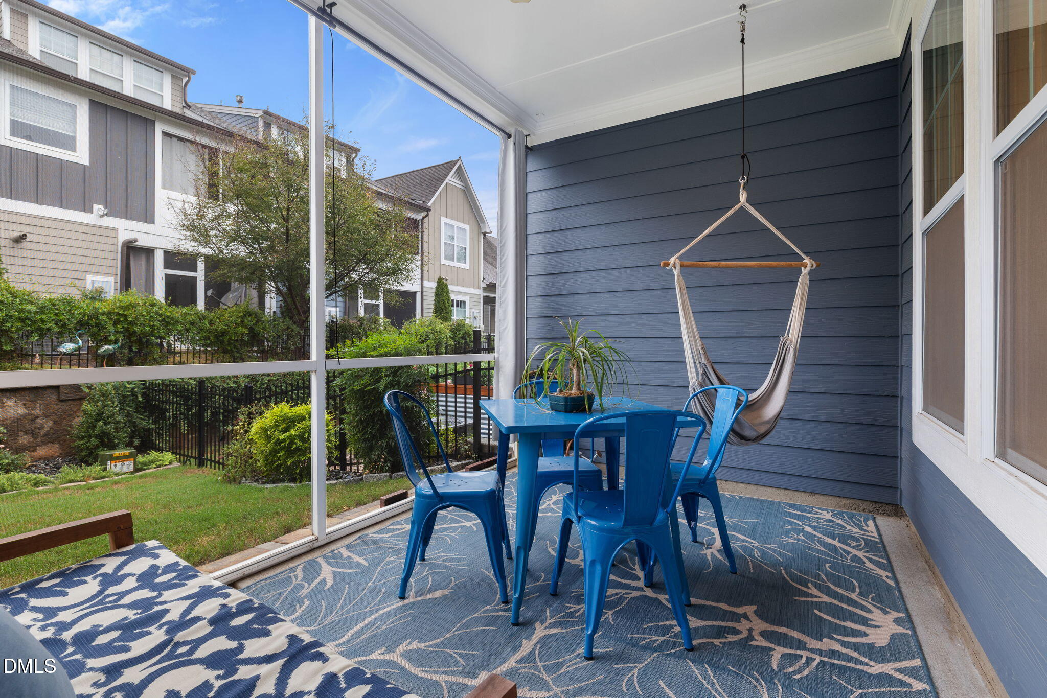 621 Fallon Grove Way Raleigh, NC 27608 - Photo 18 of 24 a view of balcony with furniture and garden