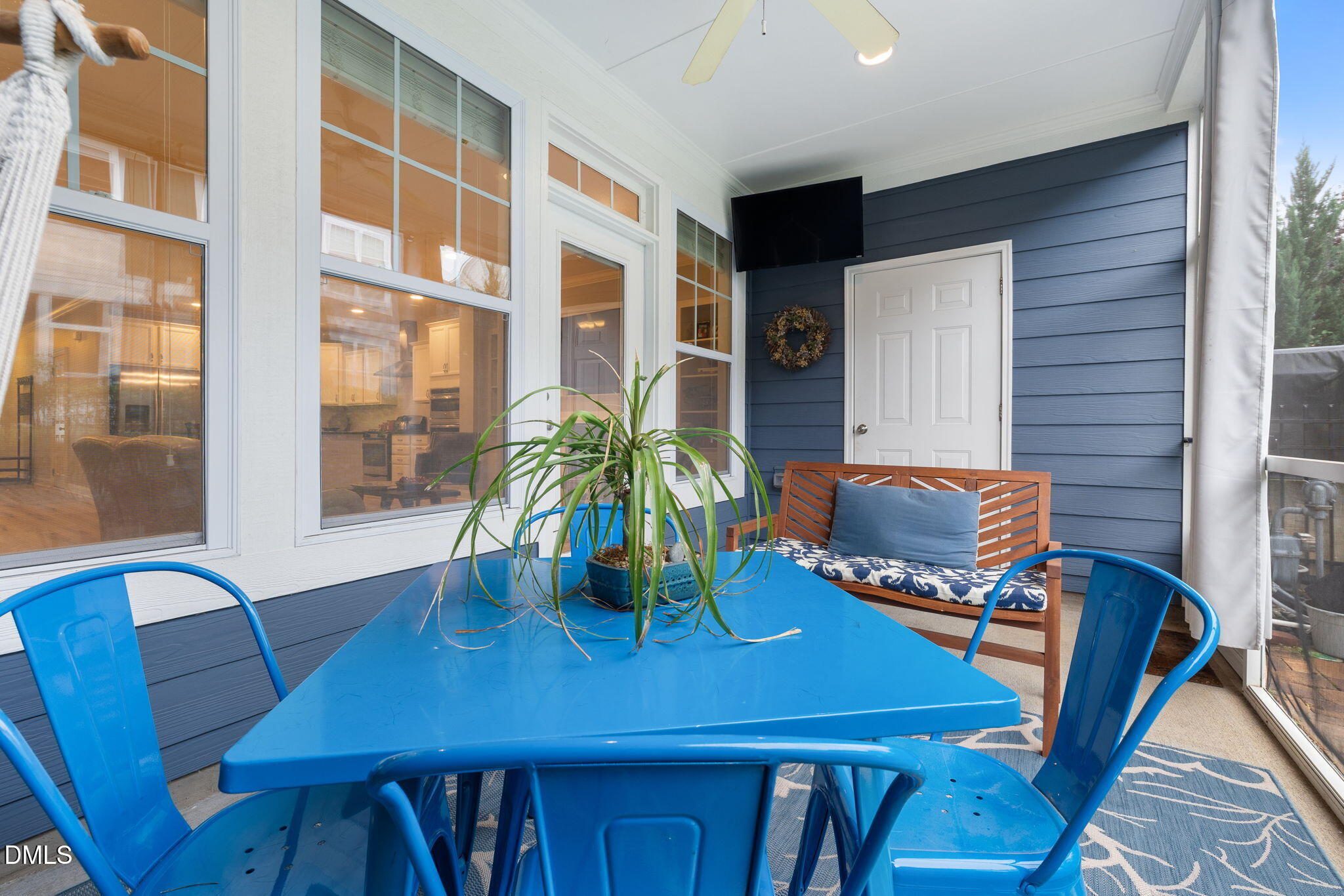 621 Fallon Grove Way Raleigh, NC 27608 - Photo 19 of 24 a view of a dining room with furniture window and wooden floor