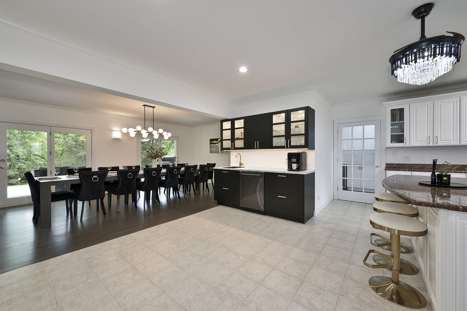 144 North Highland Road Inverness, IL 60067 - Photo 11 of 49 a large kitchen with a table and chairs