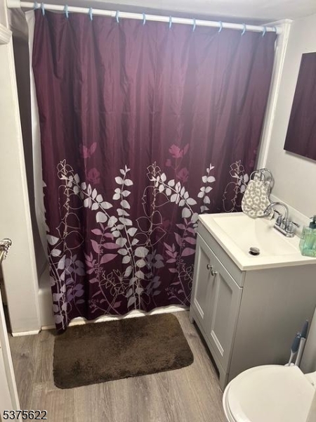 106 West Somerset Street Raritan, NJ 08869 - Photo 15 of 28 a bathroom with a toilet and sink