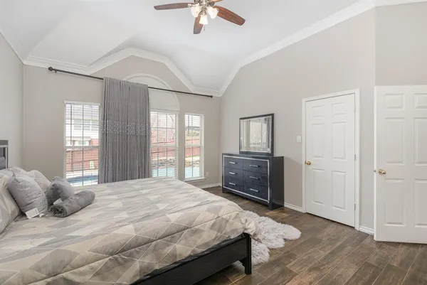 a bedroom with a bed and a fireplace