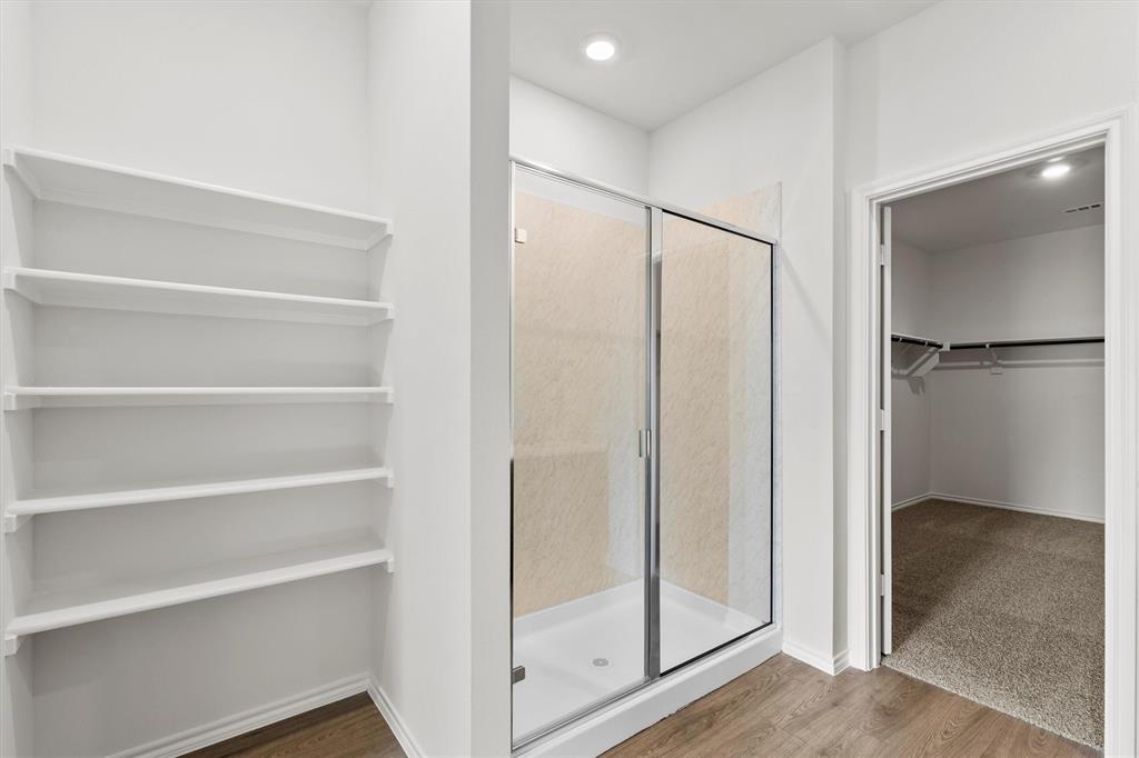 3416 Rendezvous Way Sherman, TX 75090 - Photo 12 of 24 a view of walk in closet with empty racks