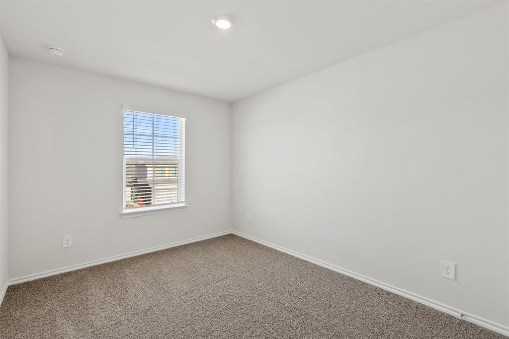 3416 Rendezvous Way Sherman, TX 75090 - Photo 15 of 24 an empty room with a window