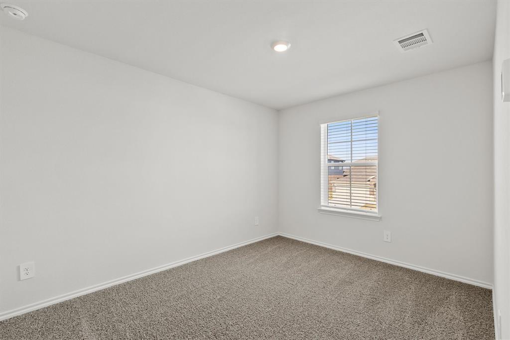 3416 Rendezvous Way Sherman, TX 75090 - Photo 17 of 24 an empty room with a window