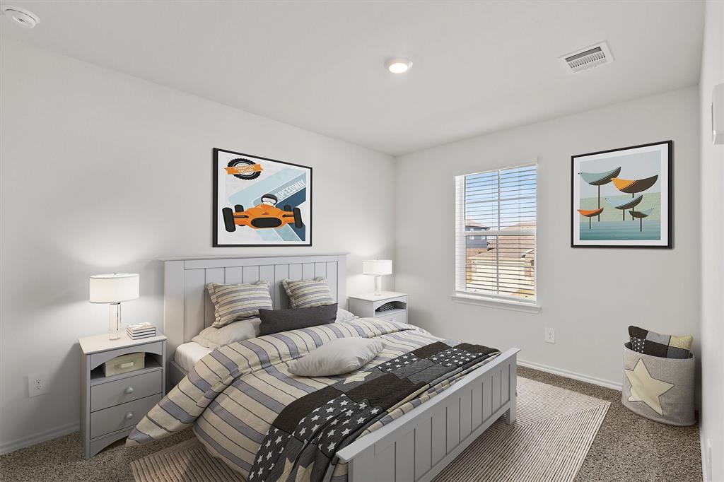 3416 Rendezvous Way Sherman, TX 75090 - Photo 18 of 24 a bedroom with a bed and a painting on the wall