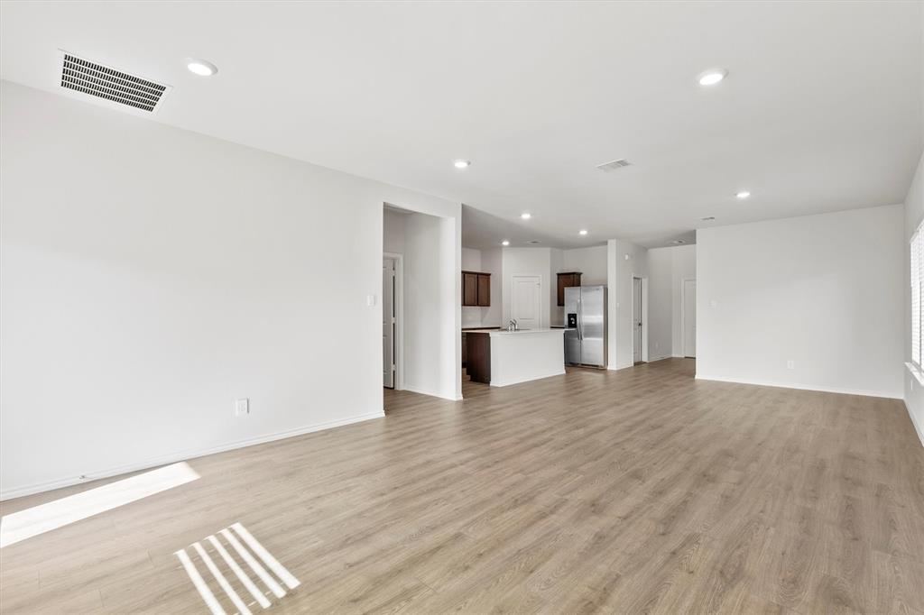 3416 Rendezvous Way Sherman, TX 75090 - Photo 6 of 24 a view of kitchen with refrigerator and a sink