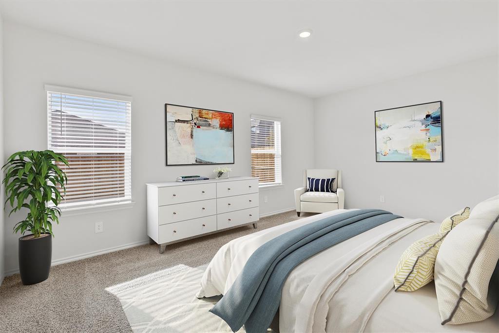 3416 Rendezvous Way Sherman, TX 75090 - Photo 7 of 24 a bedroom with a bed and a window