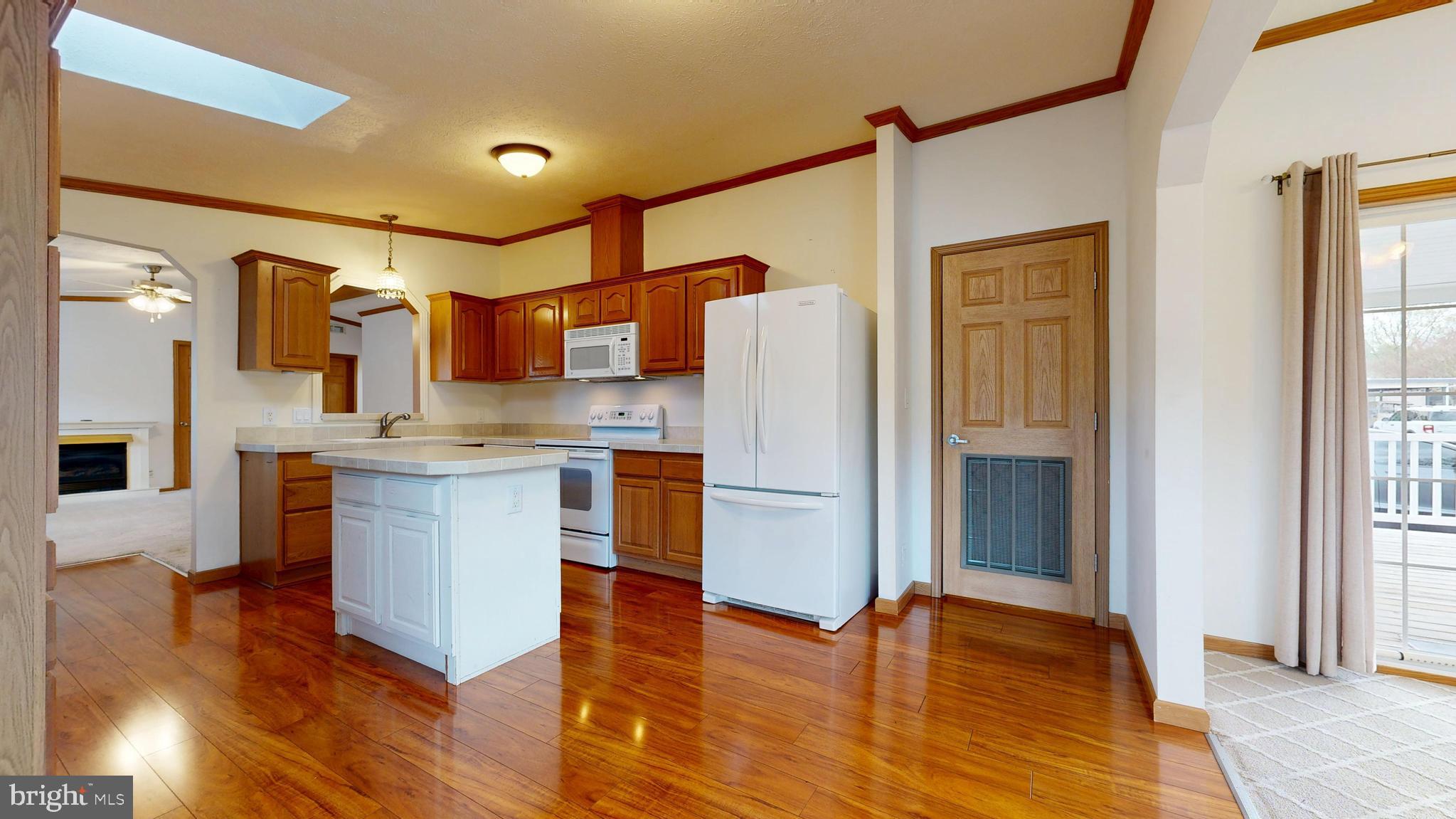 27113 Clipper Road, Unit 52505 Millsboro, DE 19966 - Photo 5 of 49 Kitchen with island