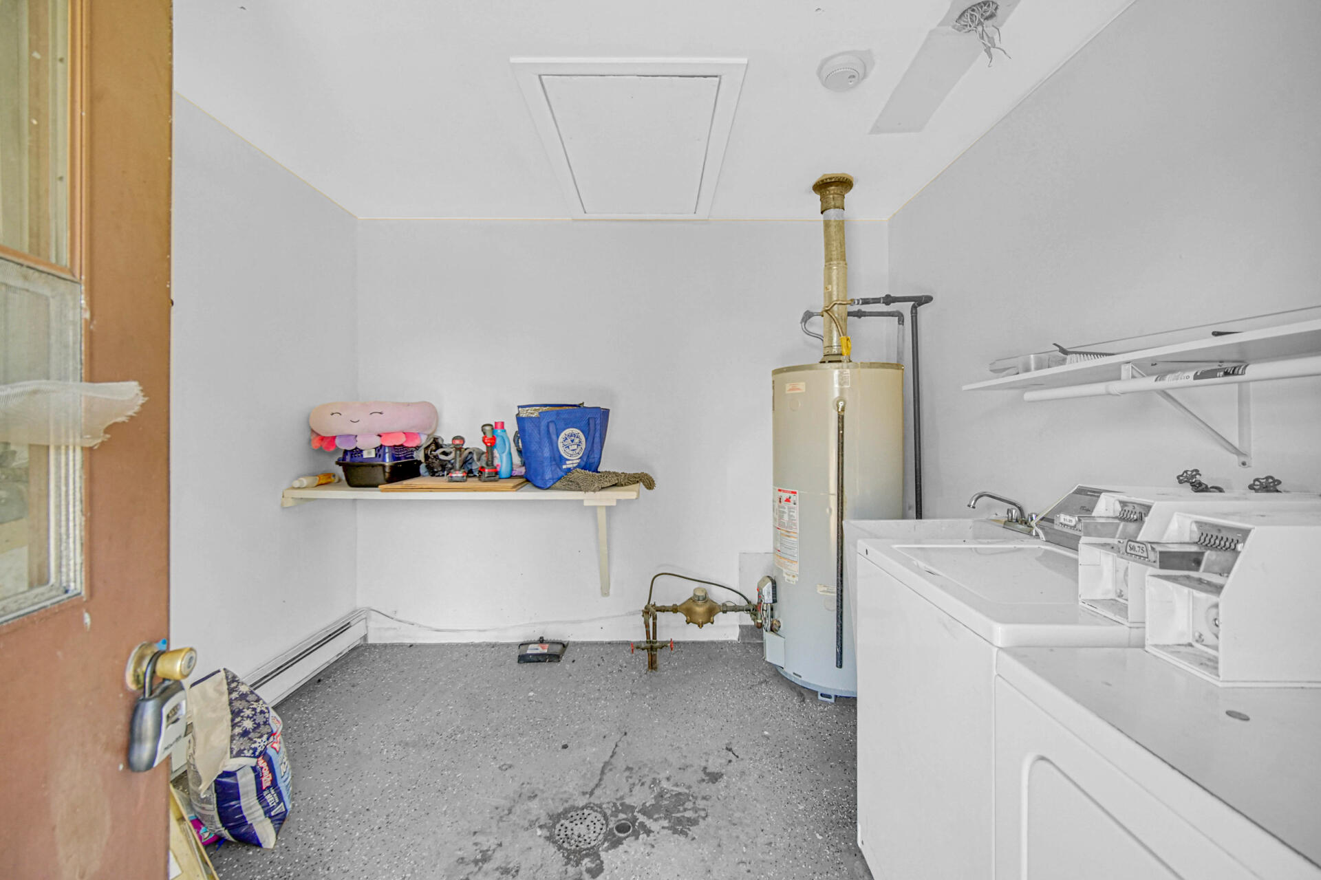 851 150th Street Hammond, IN 46327 - Photo 5 of 13 a bathroom with a sink and a mirror