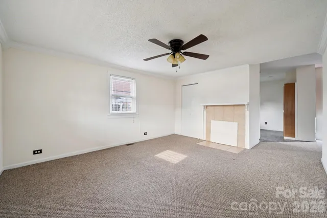 a view of a big room with carpet