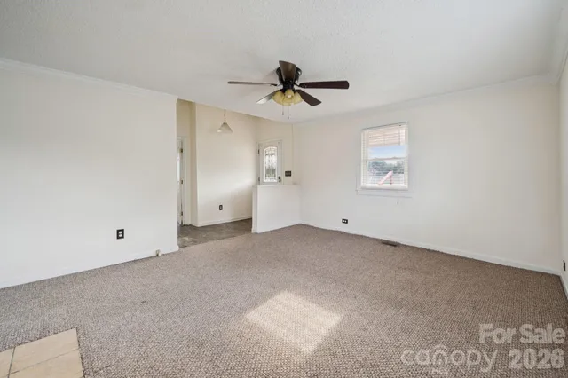 a view of a ceiling fan in a room