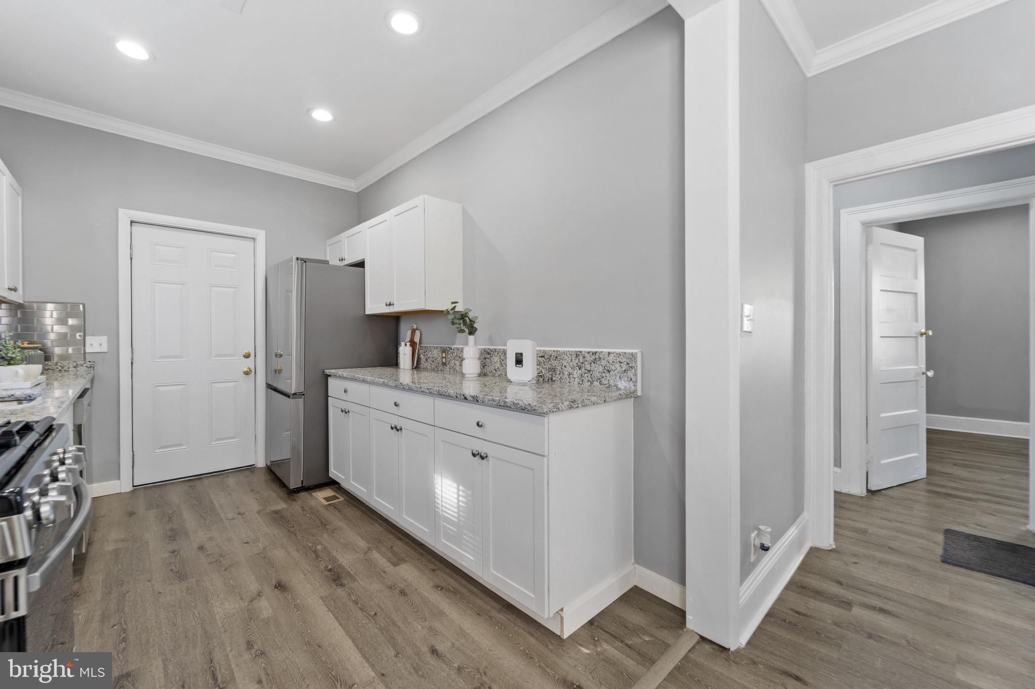 2808 Chelsea Terrace Baltimore, MD 21216 - Photo 8 of 29 Modern kitchen with sleek finishes.