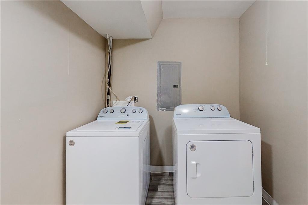 2284 Emerald Springs Drive Decatur, GA 30035 - Photo 8 of 30 a utility room with dryer and washer