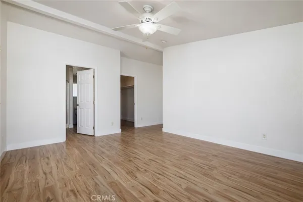 a bathroom with a shower sink and toilet