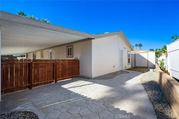 a view of a back yard of the house
