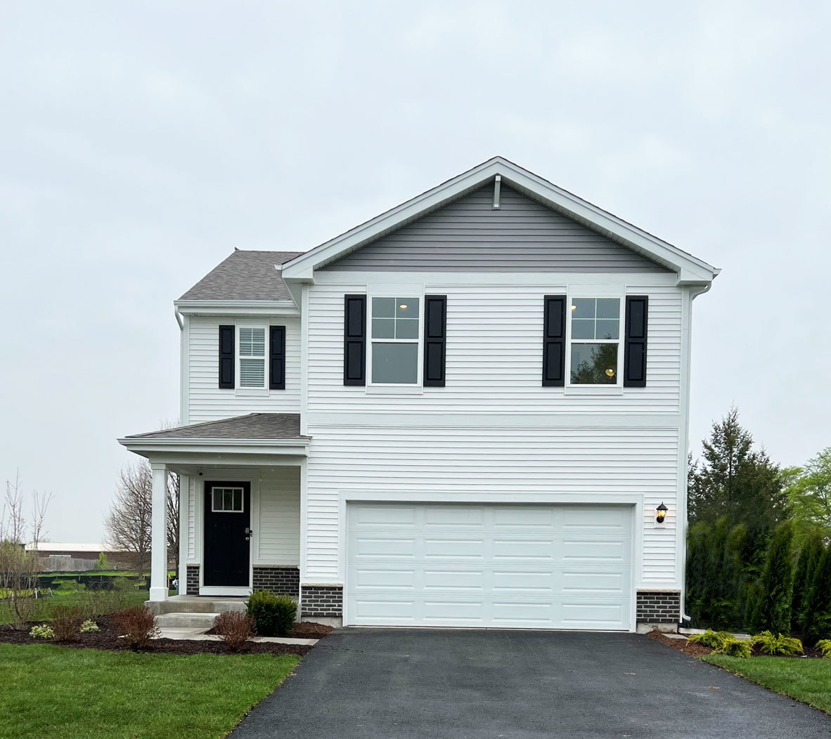 10 International Way Joliet, IL 60421 - Photo 1 of 32 a front view of a house with garden