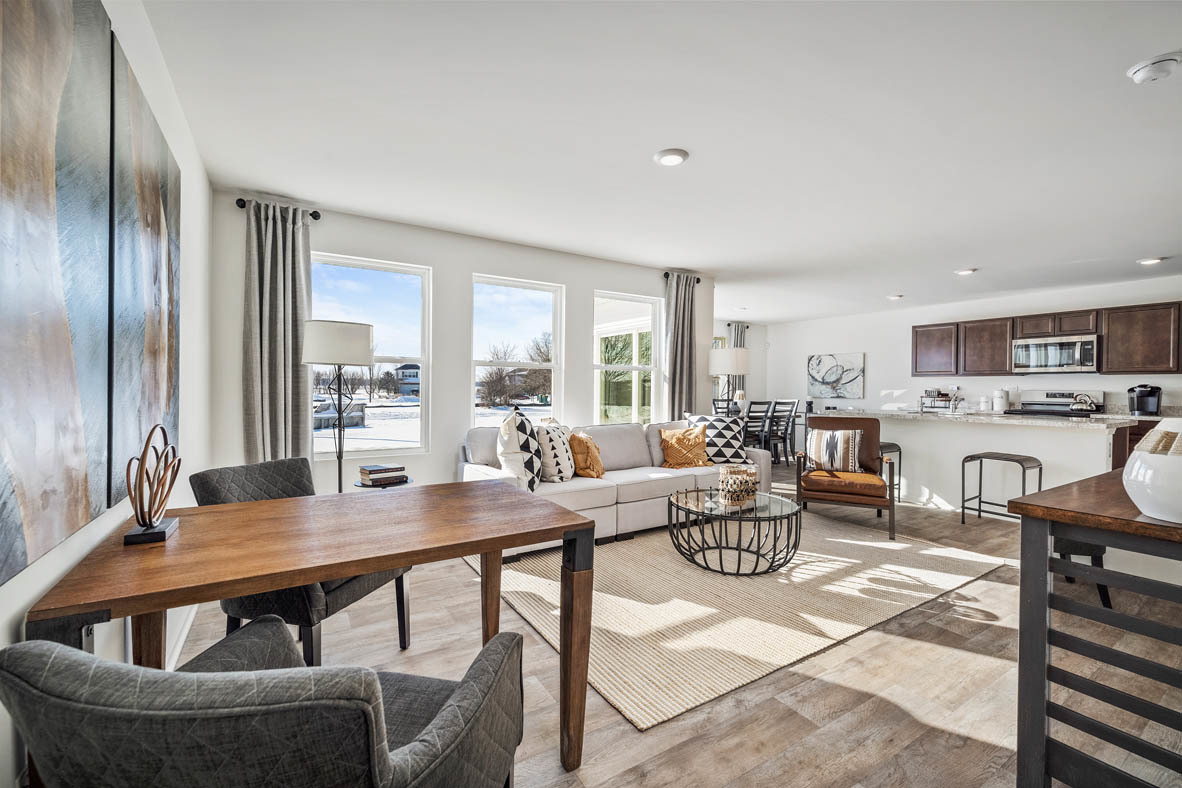 10 International Way Joliet, IL 60421 - Photo 22 of 32 a room with a table chairs and entryway