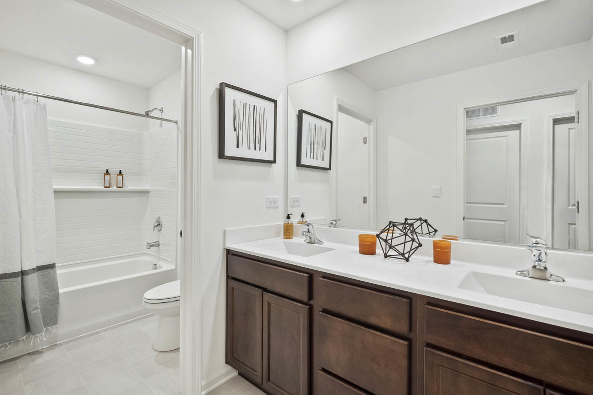 10 International Way Joliet, IL 60421 - Photo 28 of 32 a bathroom with a sink toilet tub and shower