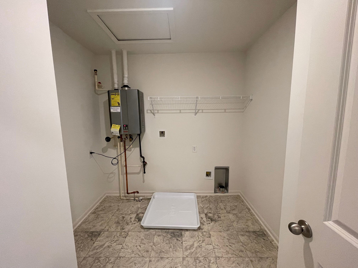 10 International Way Joliet, IL 60421 - Photo 10 of 32 a bathroom with a granite countertop shower and a sink