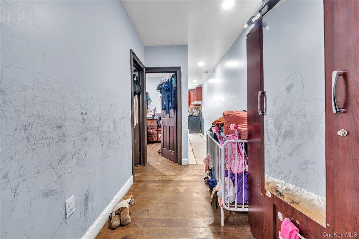 95-68 115th Street Queens, NY 11419 - Photo 12 of 28 Hall with hardwood / wood-style floors and recessed lighting