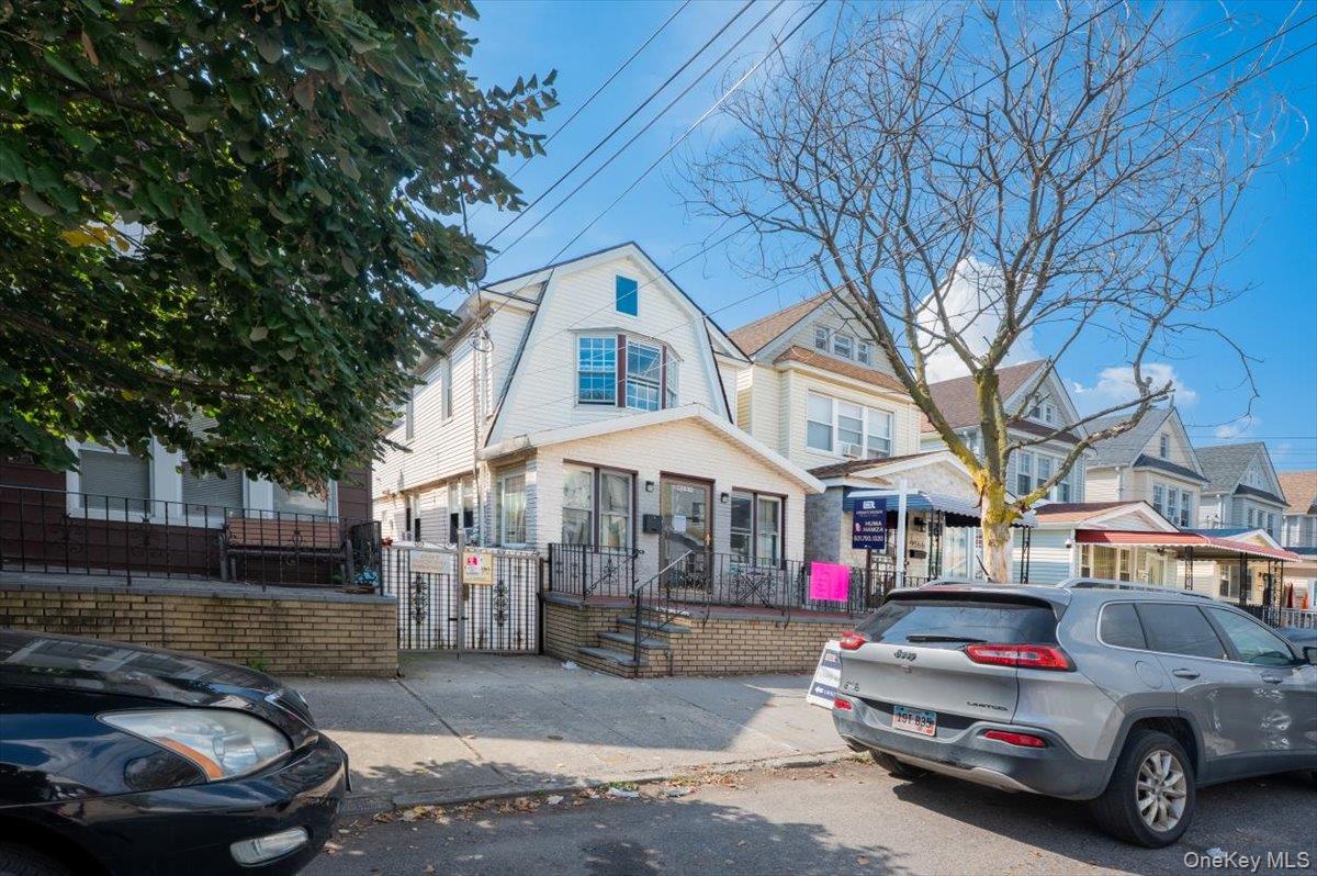 95-68 115th Street Queens, NY 11419 - Photo 25 of 28 View of front of property with a residential view