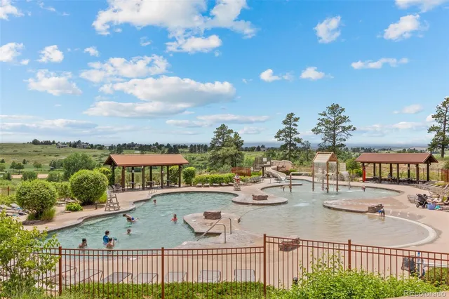 a view of swimming pool from balcony