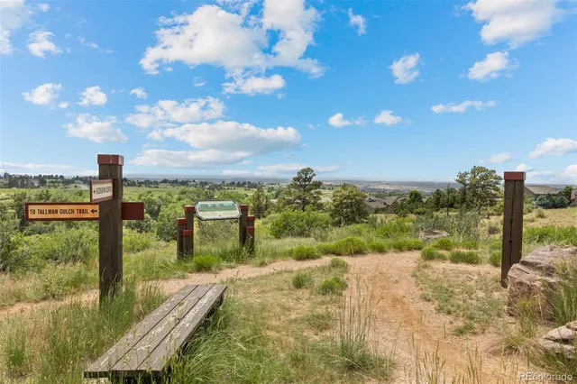 a view of a swimming pool with a terrace