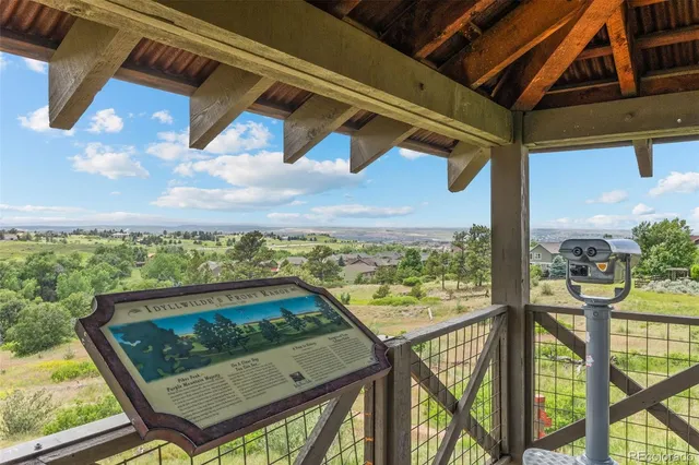 a view of a balcony with lake view and a ocean view