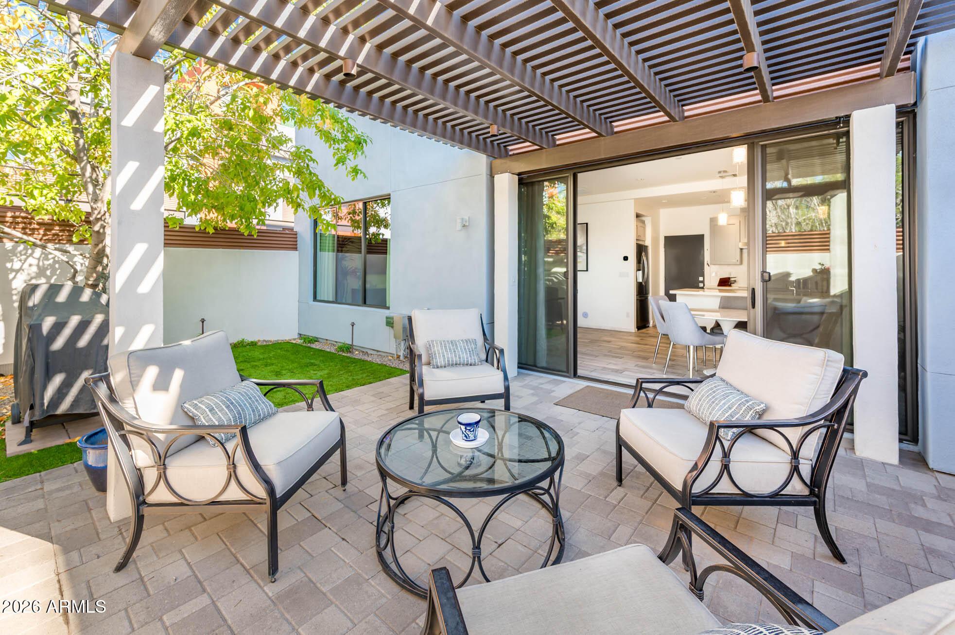 4416 North 27th Way Phoenix, AZ 85016 - Photo 15 of 46 a view of a chairs and table in patio